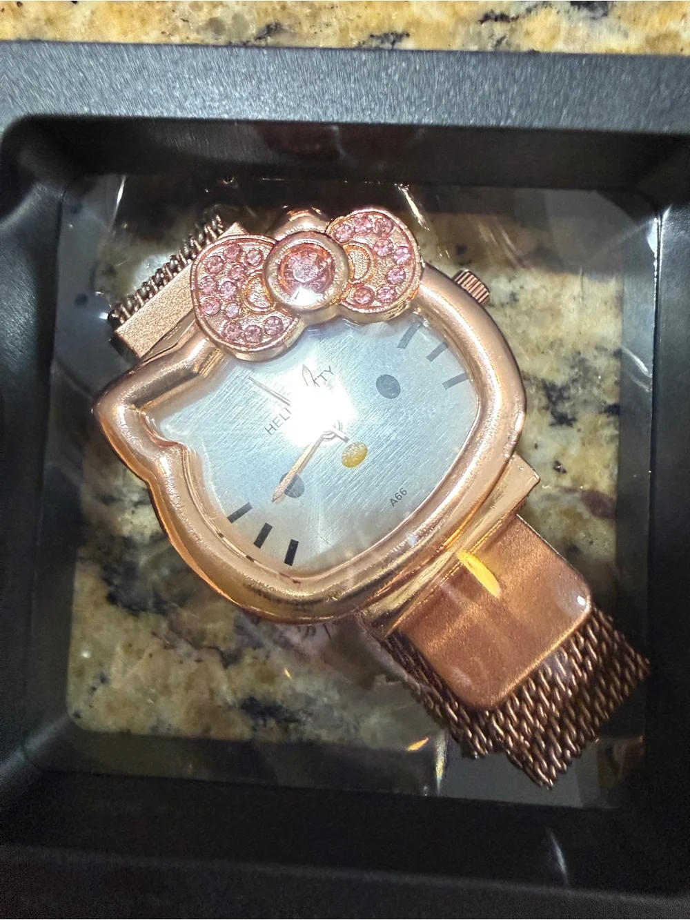 Hello Kitty Rose Gold Tone Mesh Watch with Crystal Bow Accent